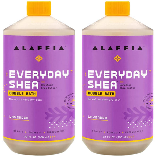 Alaffia Everyday Shea Bubble Bath bottle being poured for a soothing soak.