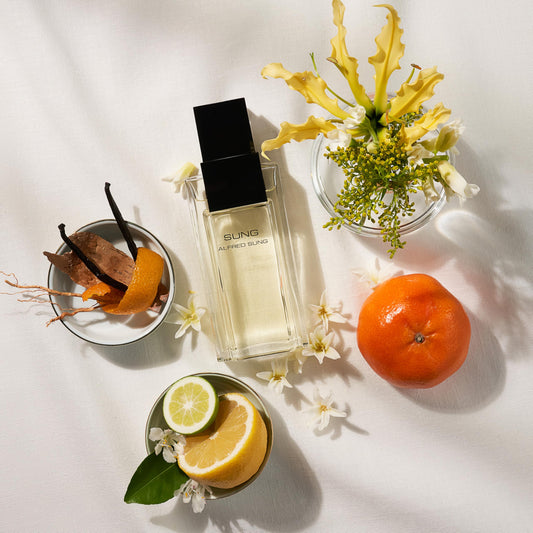 Alfred Sung Sung bottle side profile, modern chic packaging for daily wear.