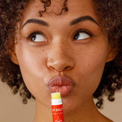 ALIDA PURE lip balm application on lips with smooth glide