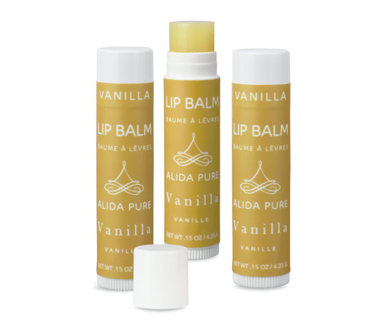 ALIDA PURE Vanilla Lip Balm packaging highlights vegan, beeswax-free formula and eco-friendly design.