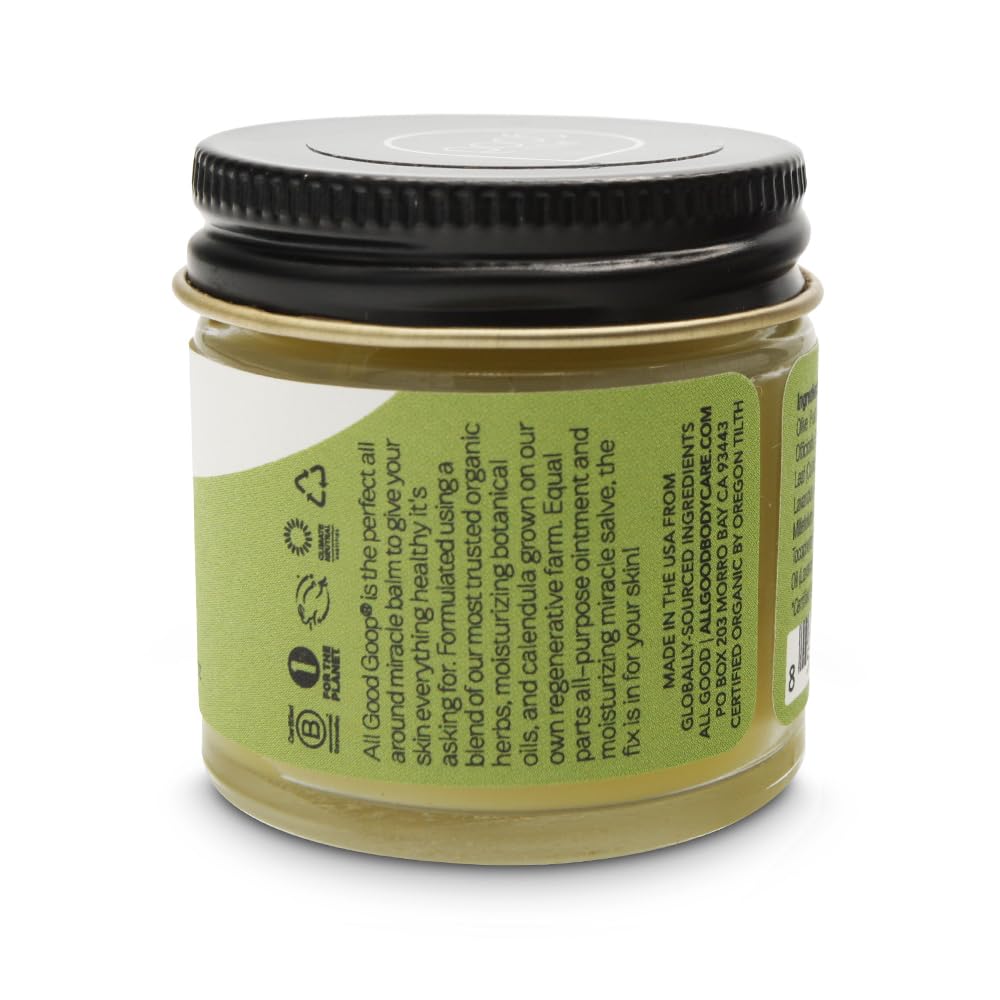 All Good Goop balm application on hands and feet for dry skin relief.