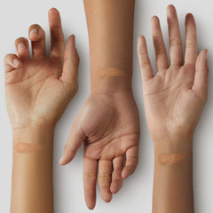 Close-up of foundation texture highlighting creamy, lightweight feel on skin.