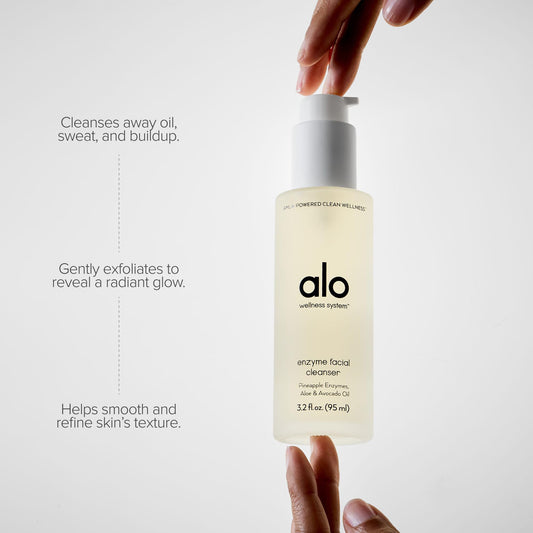 Close up of Alo cleanser lather and citrus scent on skin