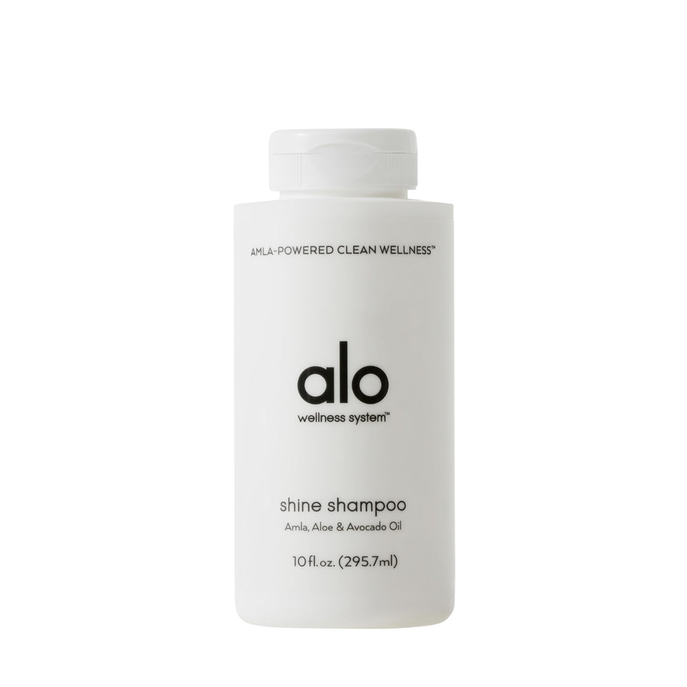 Alo Shine Shampoo bottle with glossy finish for smooth, frizz-free hair.