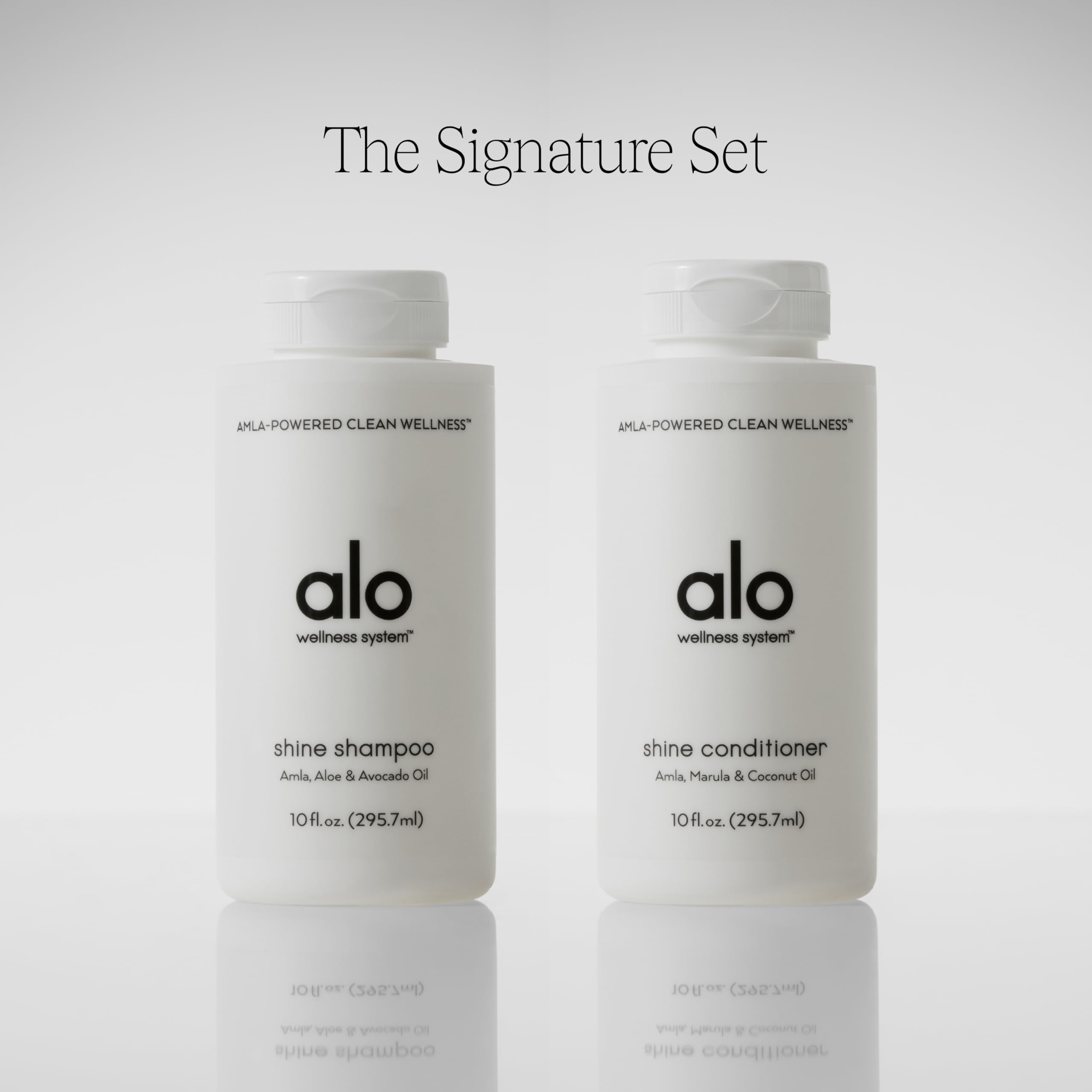 Creamy lather forming as Alo Shine Shampoo cleanses without sulfates.