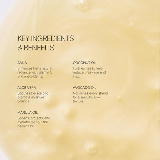 Close-up of Alo Shine Shampoo bottle highlighting frizz defense and soft hair.