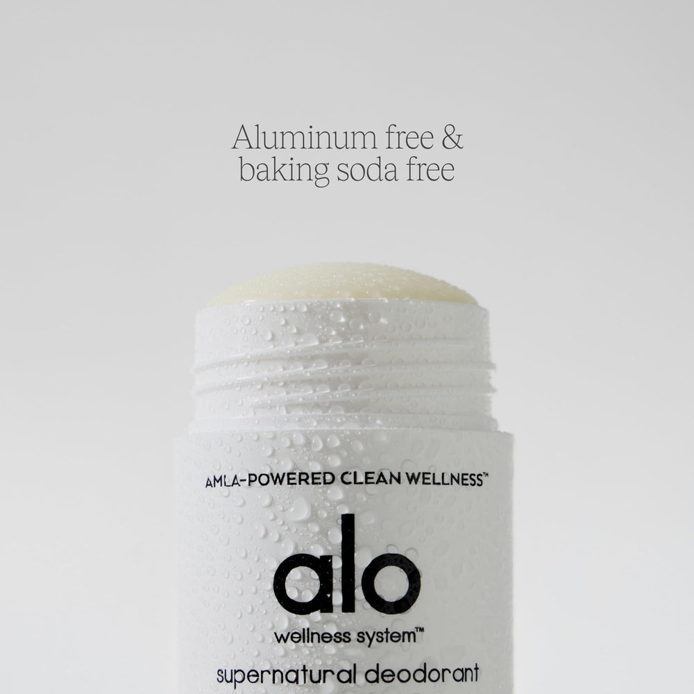 Alo Supernatural Deodorant underarm application close-up for easy daily use.