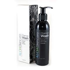 ALOA Detoxifying Charcoal Face Wash bottle close-up for deep pore cleansing.