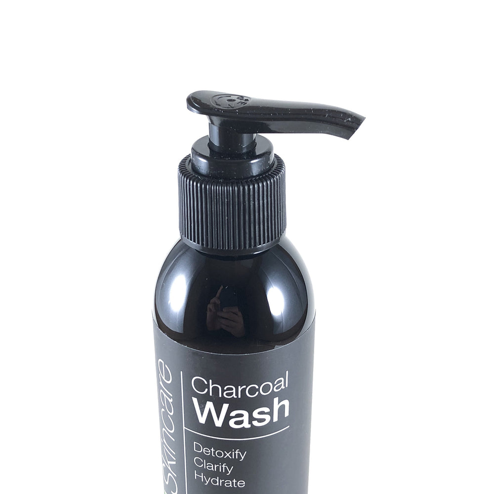 ALOA Charcoal Face Wash foam texture showing gentle exfoliation of pores.