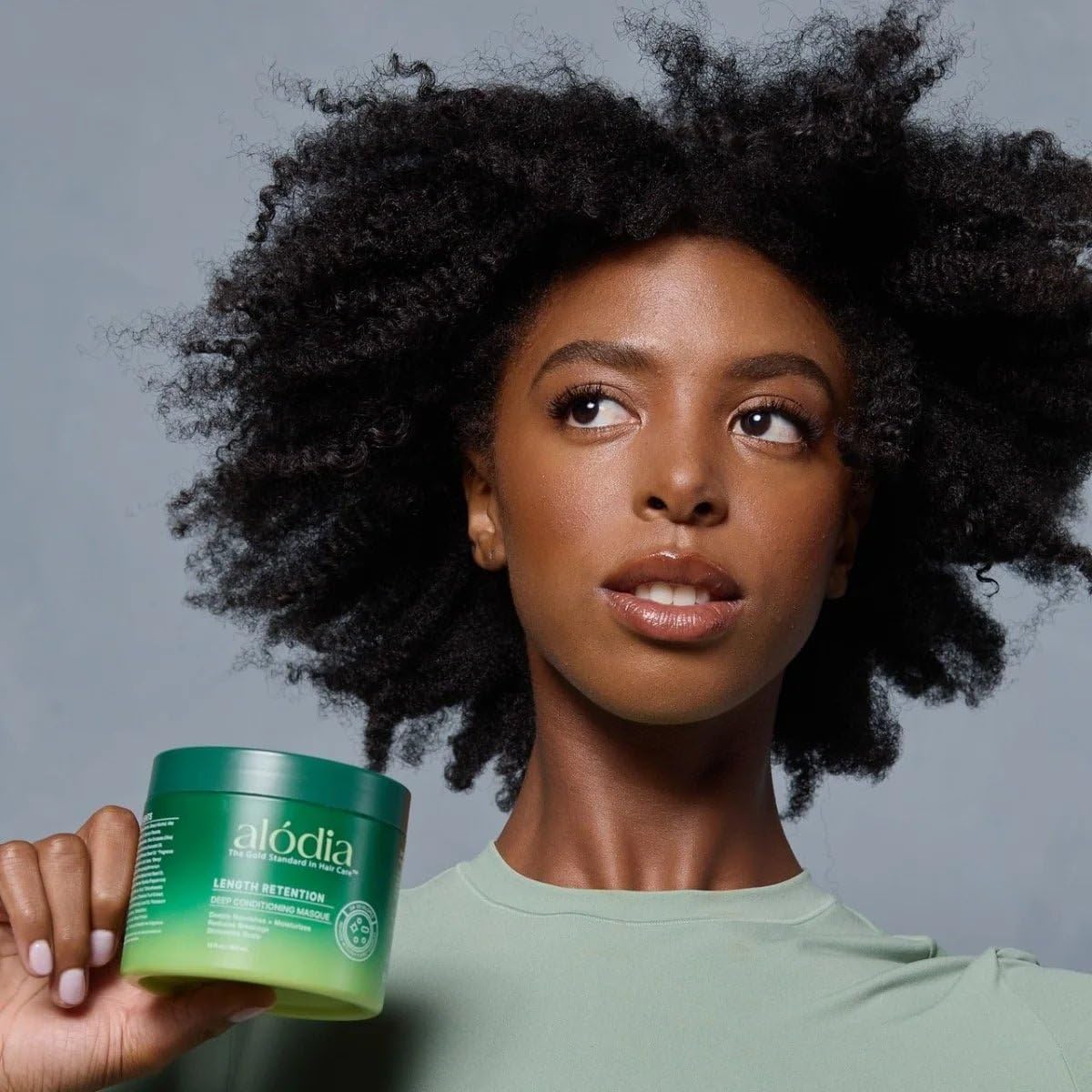 ALODIA Deep Conditioning Masque on glossy curls after treatment.