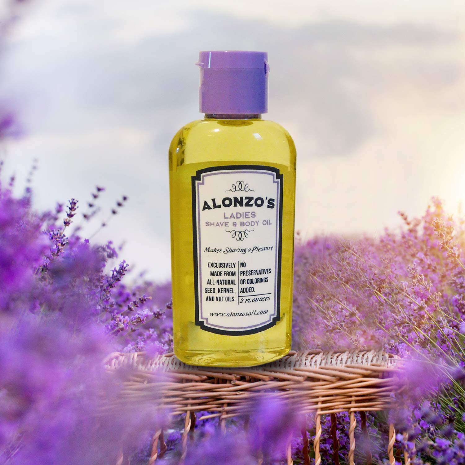 Applying ALONZO'S SENSATIONAL SHAVE oil before shaving to reduce friction