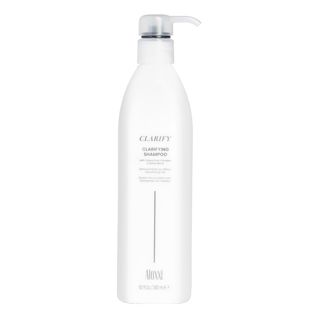 ALOXXI Clarifying Shampoo bottle pour shows a gentle detox for color-treated hair.