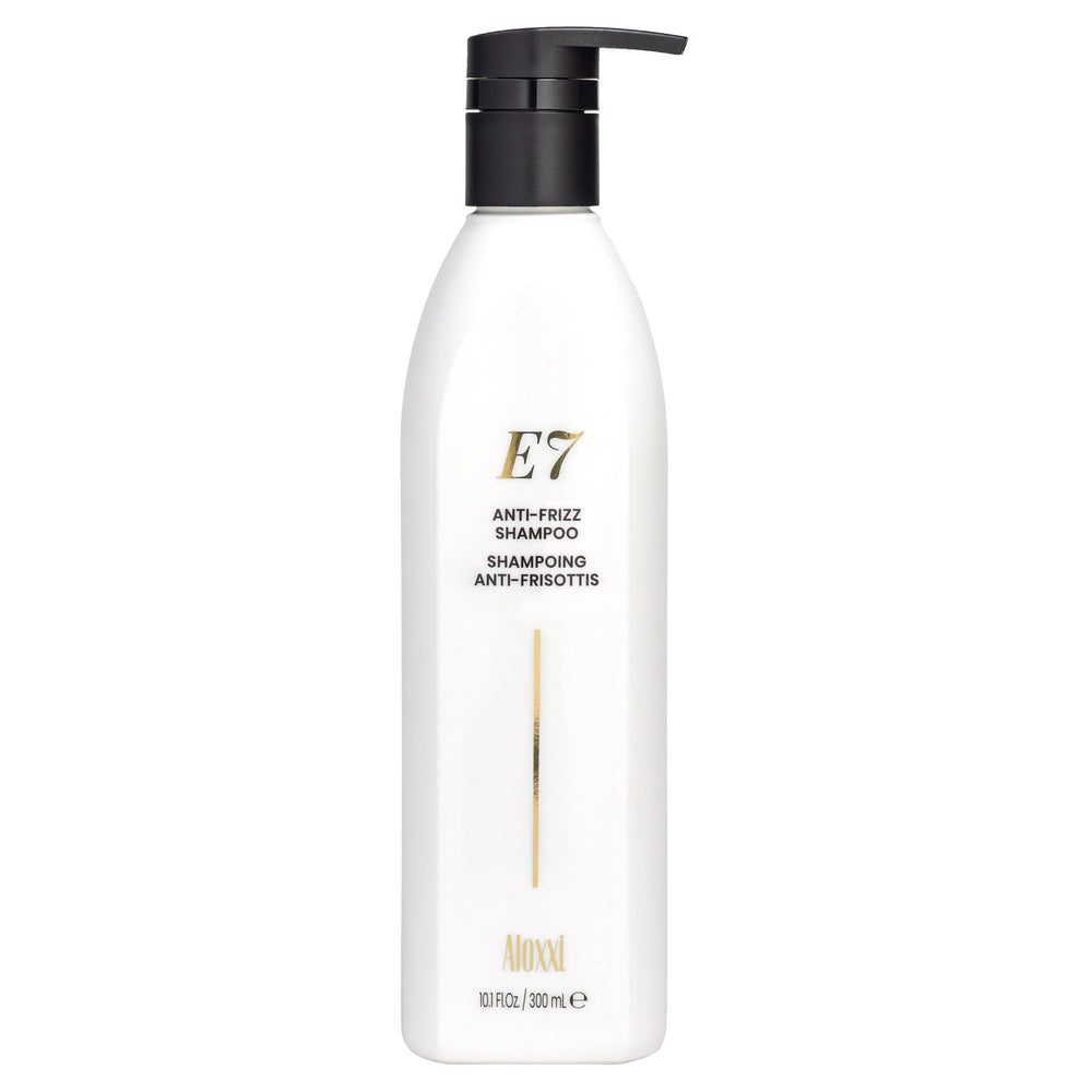 ALOXXI E7 anti-frizz shampoo bottle pour for smooth, frizz-free styling.