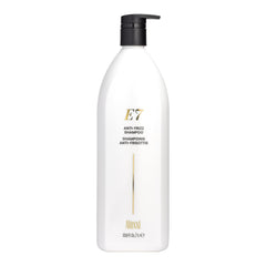 ALOXXI E7 shampoo packaging highlights a color-safe, antioxidant-rich formula for damaged hair.