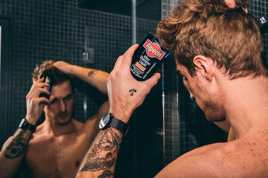 Alpecin After Shampoo Liquid in-use shot shows leave-in scalp treatment application.