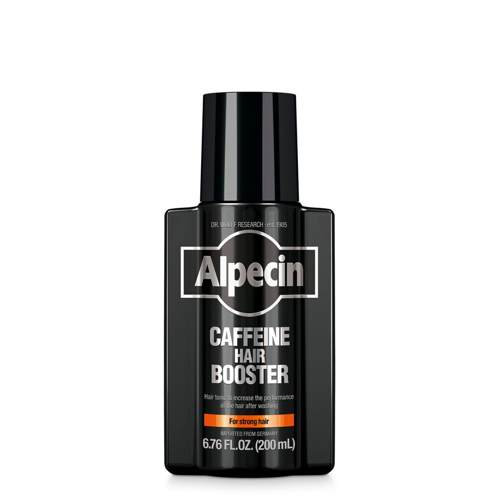 Alpecin Caffeine Hair Booster bottle pour with new fragrance for refreshing scalp routine.