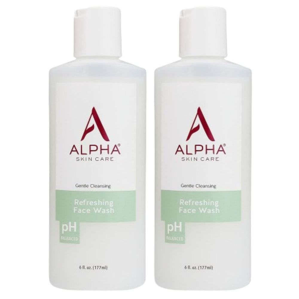 Alpha Skin Care Refreshing Face Wash bottle with label showing gentle cleansing for all skin types.