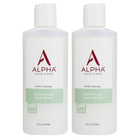 Alpha Skin Care Refreshing Face Wash bottle with label showing gentle cleansing for all skin types.