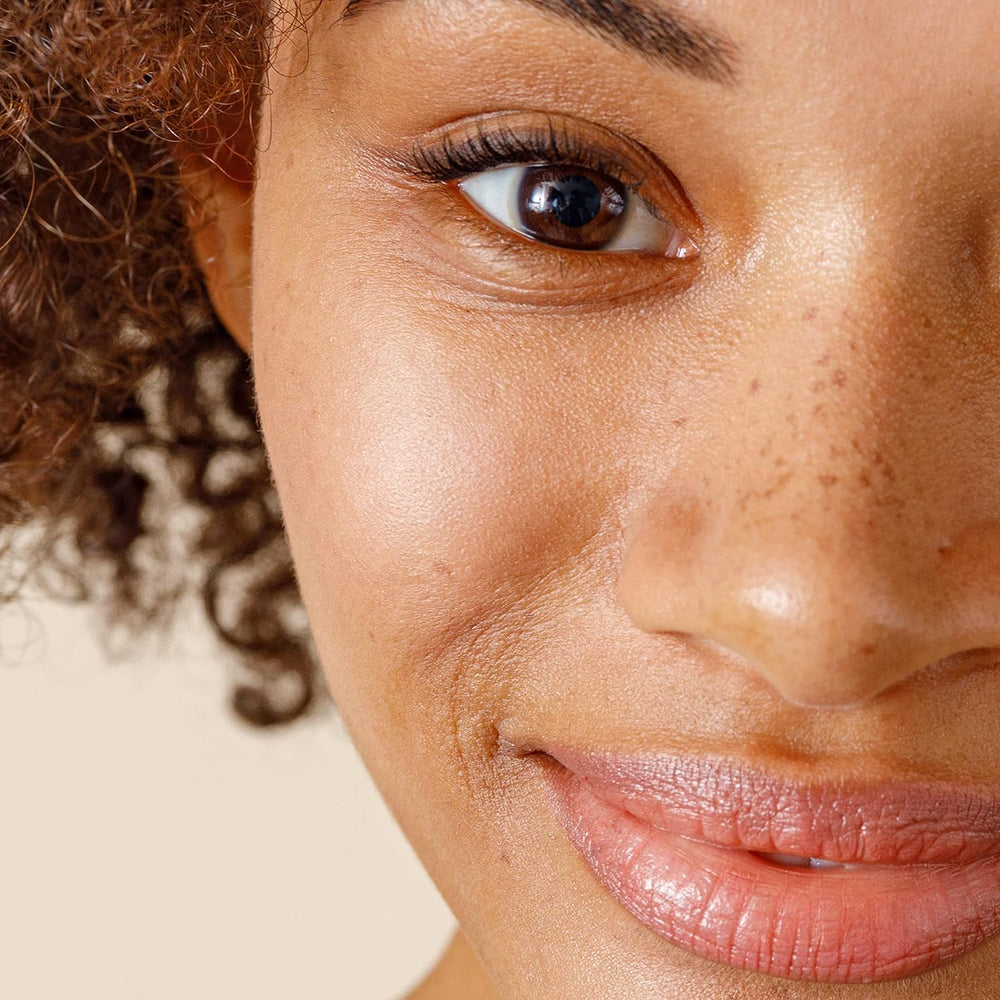 Applying Alpha Renewal Serum on clean skin for daily use
