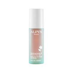Alpyn Beauty Clarifying Oil bottle with retinol and pink algae showcases premium formula.