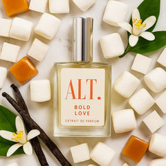 ALT. FRAGRANCES Bold Love bottle cap, compact design ideal for travel touch-ups.