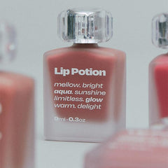 Alternativestereo Lip Potion Aqua Glow Apple Drop lip swatches show vibrant hues.