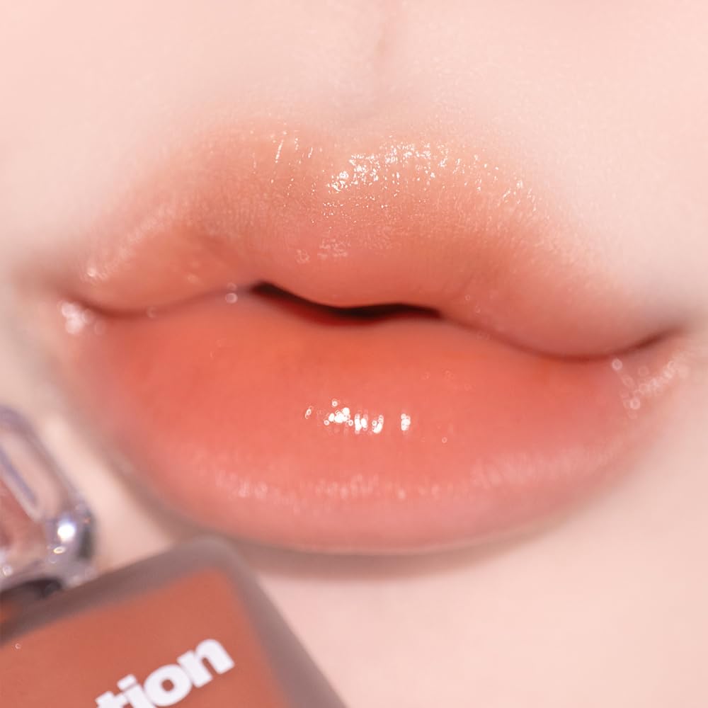 Alternativestereo Lip Potion Aqua Glow No.2 Fig Candy adds warm, playful tint with non-sticky feel