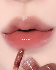 alternativestereo lip potion aqua glow no.9 coco milk cap closeup reveals sleek packaging
