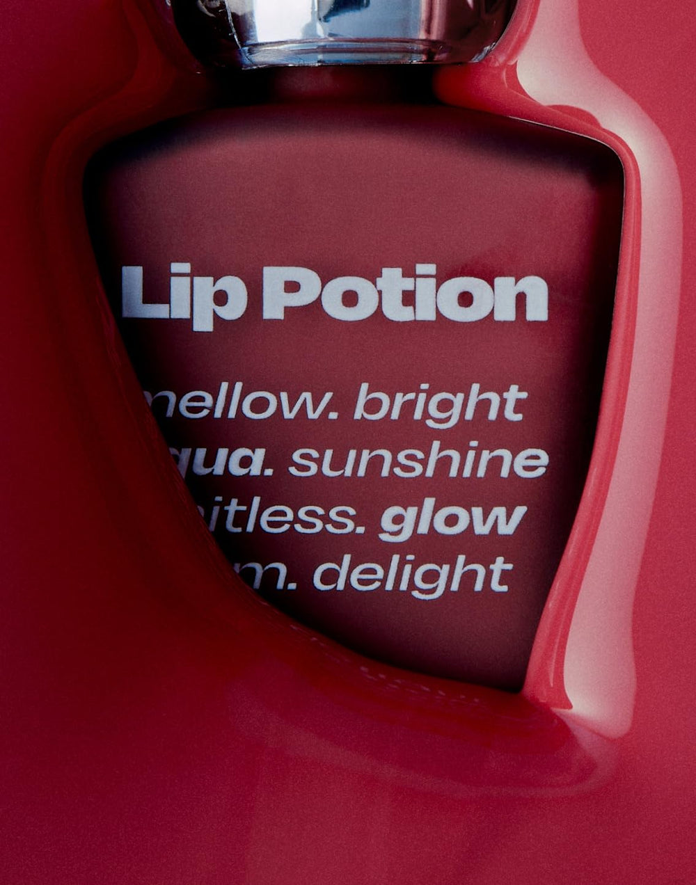 alternativestereo Lip Potion Aqua Glow Raspberry Soap no5 bottle displays berry tint.