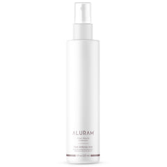 ALURAM Heat Defense Mist bottle front shows lightweight protection for all hair types.