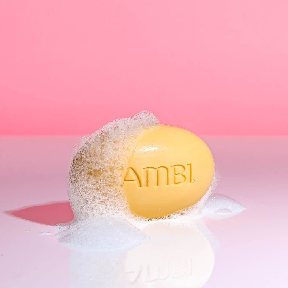 Ambi bar on skin demonstrates moisturizing benefits during cleansing.
