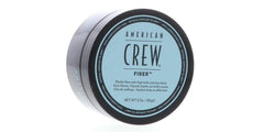 Dispensing American Crew Men Fiber cream for customizable texture.