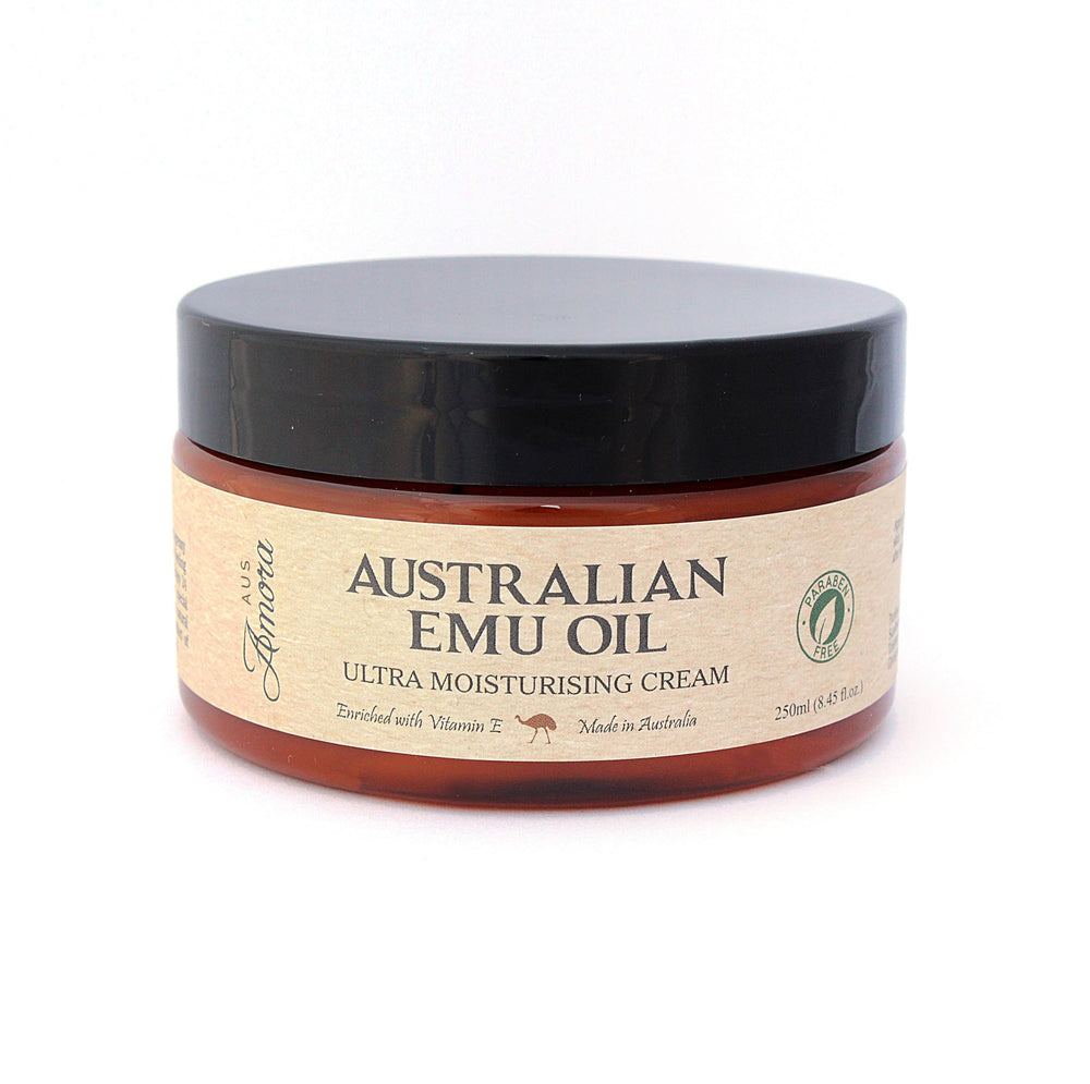 Amora Emu Oil Cream jar close-up showing rich moisturizing texture for face and body.