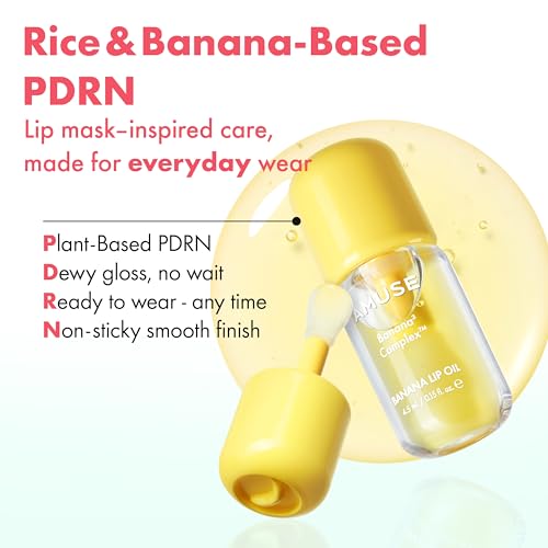 Amuse Seoul Banana Lip Oil on lips reveals sheer color and healthy glow.