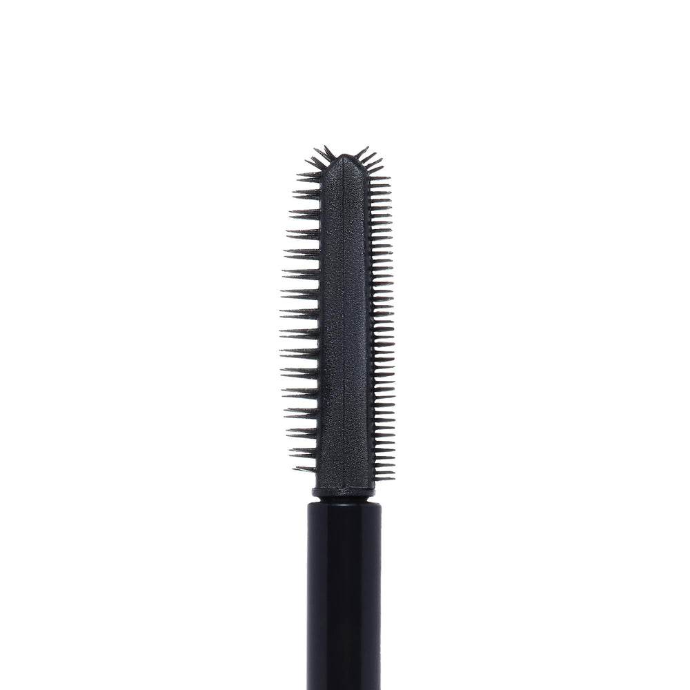 Brow Freeze Gel clear swatch on brow demonstrating invisible hold