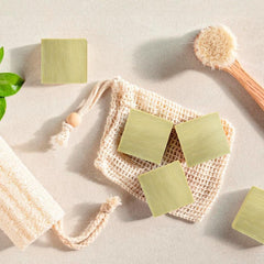 Handmade Aleppo soap bar in use, creating a mild, creamy lather.