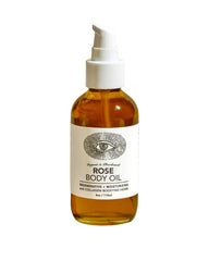 Anima Mundi Apothecary Rose Body Oil bottle with rose aroma for deep hydration.
