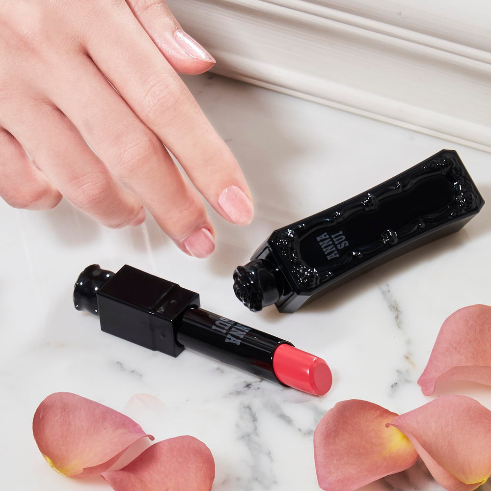 Long-lasting shine and moisture from ANNA SUI Lipstick Rouge.