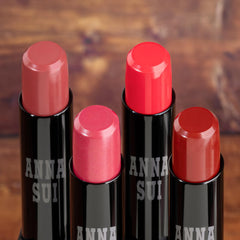 Anna Sui Lipstick Rouge vibrant color display for day-to-night looks.