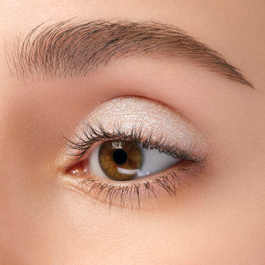 ANNA SUI Shiny Eye Color 001 swatch on skin highlights long-lasting luminous finish.
