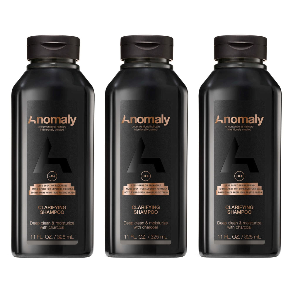 Anomaly Clarifying Shampoo bottle highlighting eco-friendly packaging and charcoal cleansing benefits