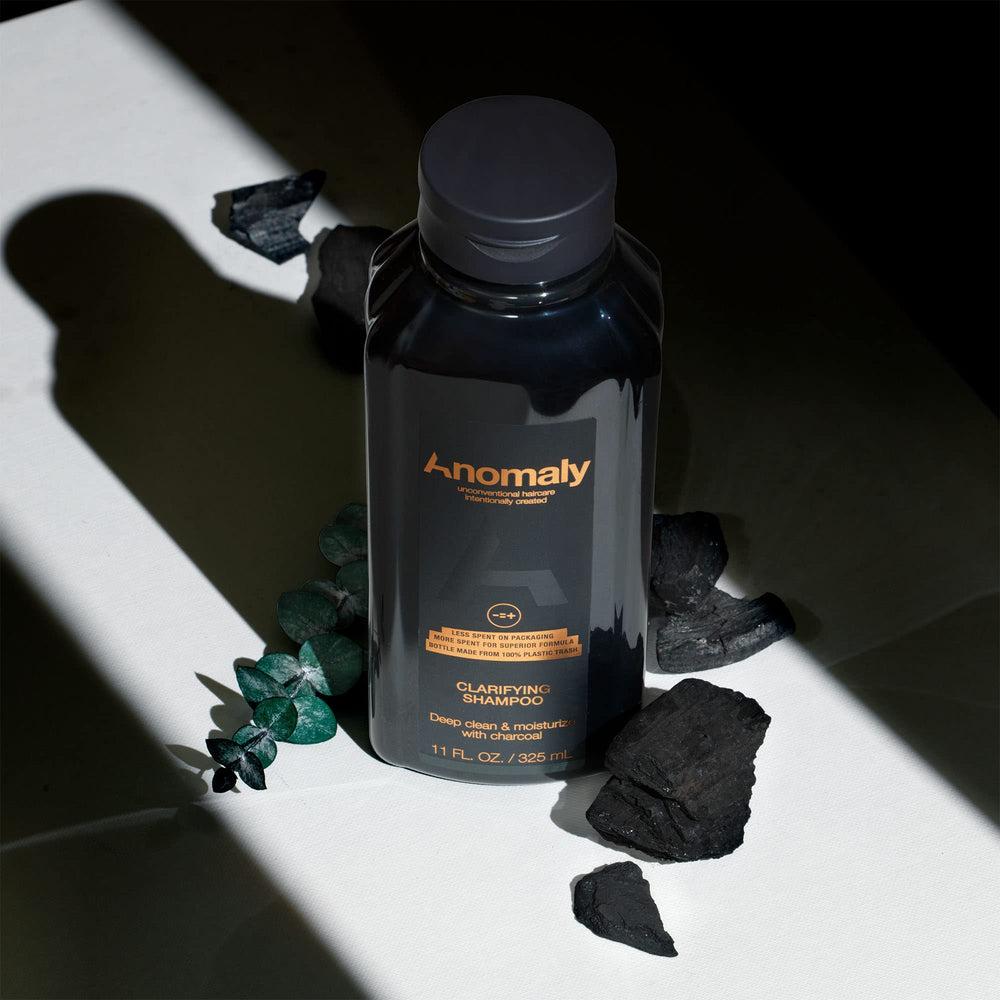 Anomaly Clarifying Shampoo label closeup showing vegan and clean formula