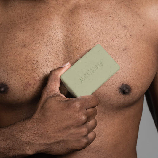 Anthony Buff It Hydrating Bar with jojoba beads exfoliates gently for brighter skin.