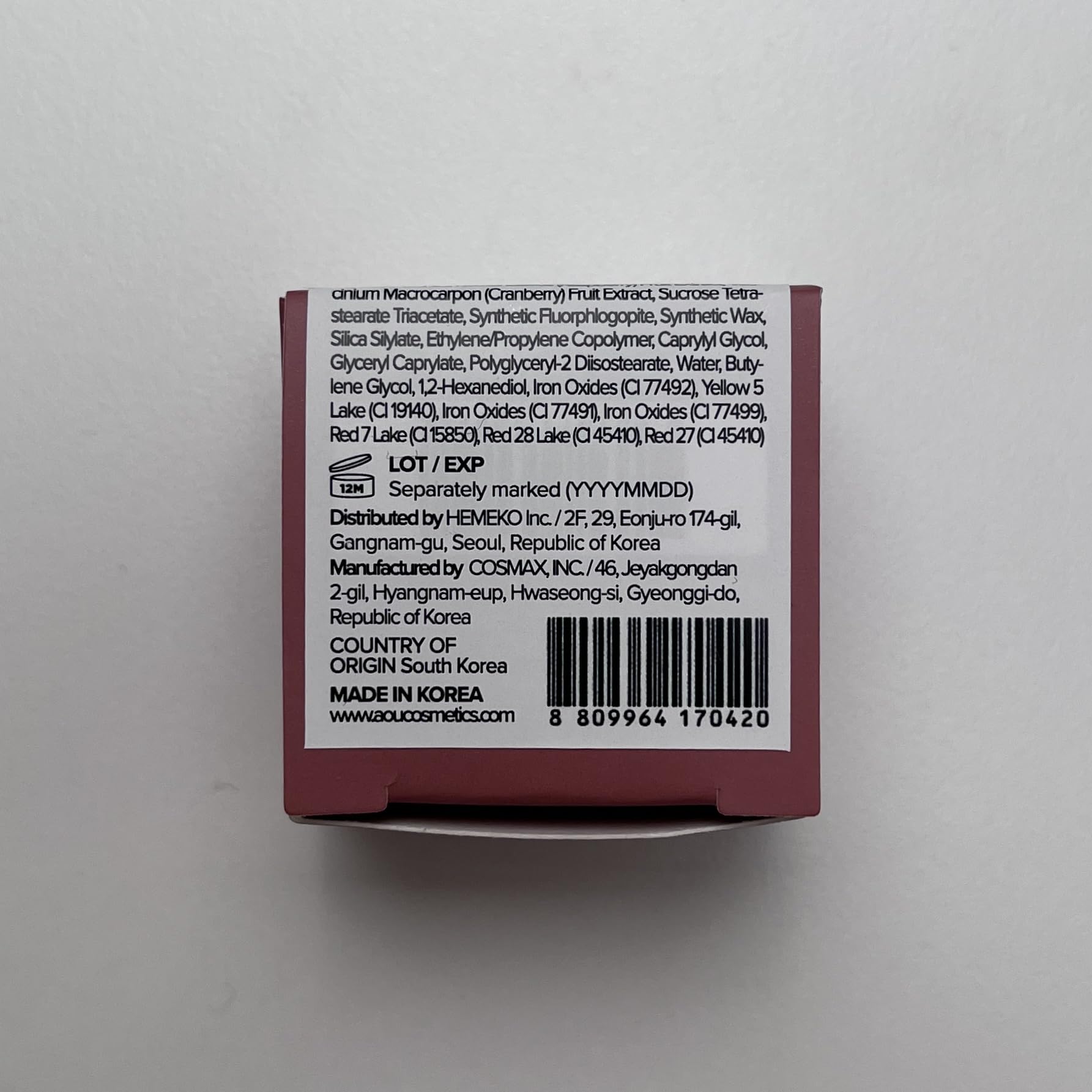 AOU Glowy Tint Balm being applied to lips for instant tint