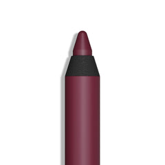 Araceli gel pencil eyeliner in wine applied as a smooth stroke for defined eyes.