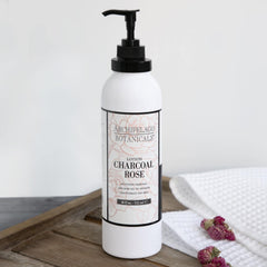Rose extract swirl in Archipelago Charcoal Rose Lotion suggests soothing floral aroma