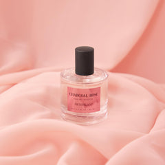 Archipelago Charcoal Rose bottle close-up showing light, versatile diffusion.
