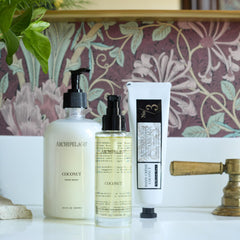 Archipelago Botanicals Coconut Hydrating Body Oil pump demonstrates easy, quick absorption for daily use.