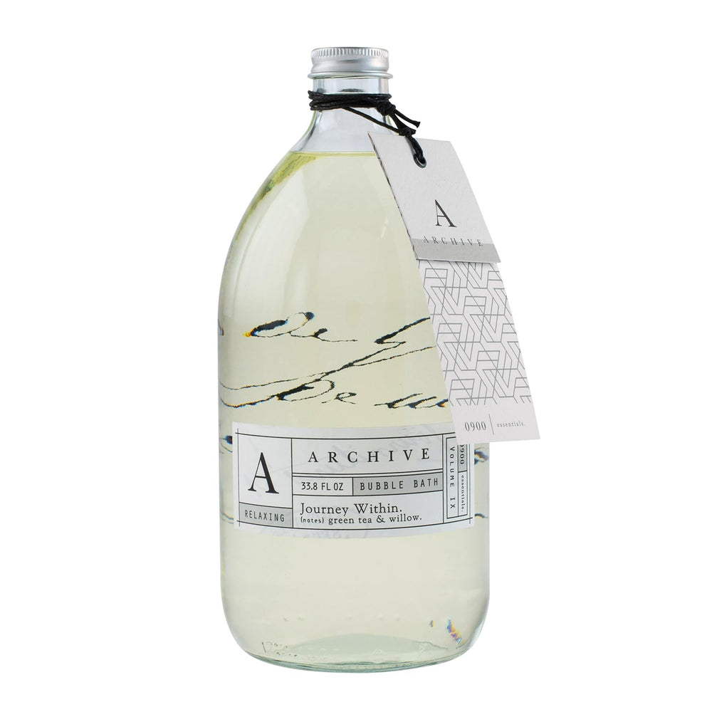Archive Journey Within bubble bath being poured for a luxurious relaxing soak