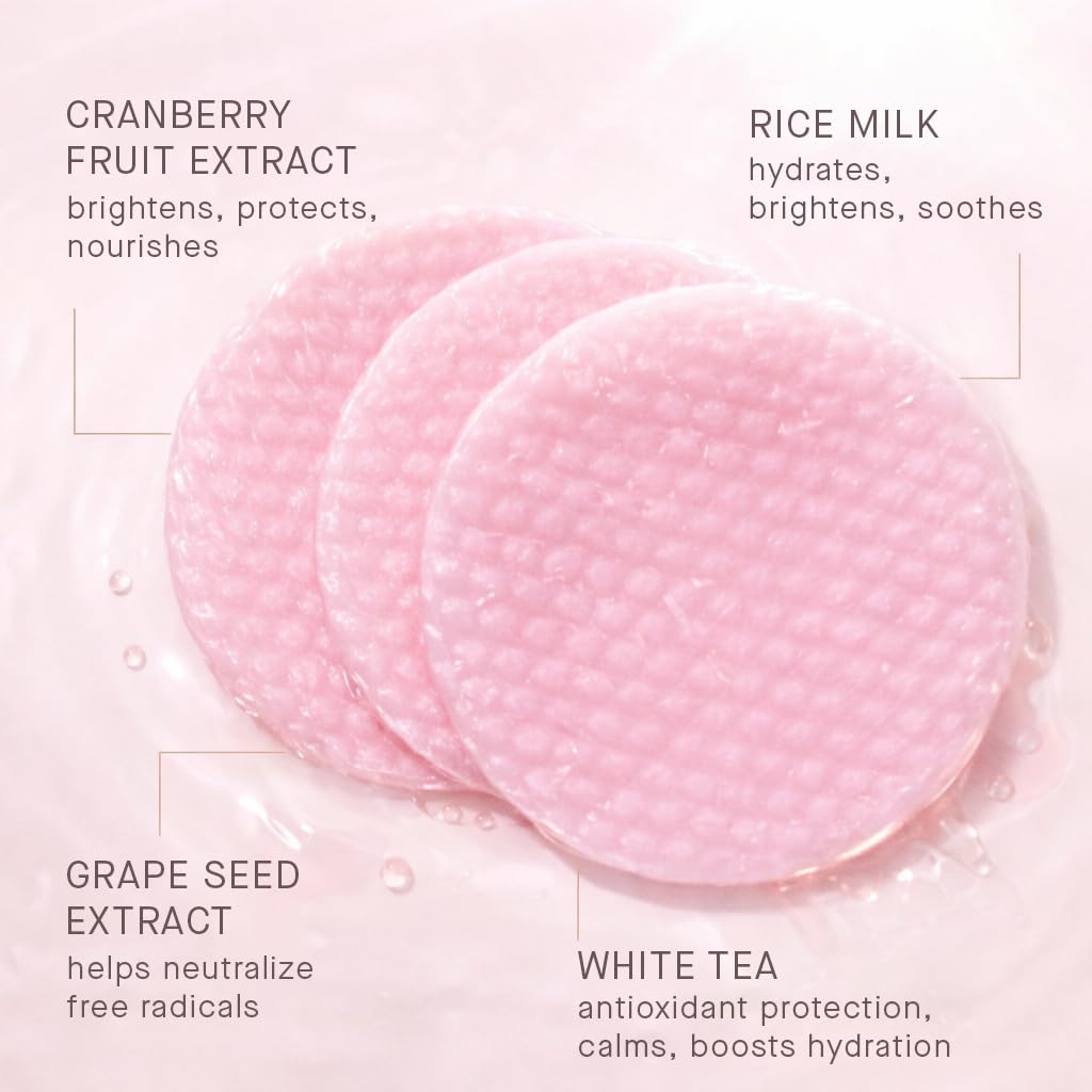 ARCONA Cranberry Triad Milky Toner Pads applied to the face for gentle cleansing and glow